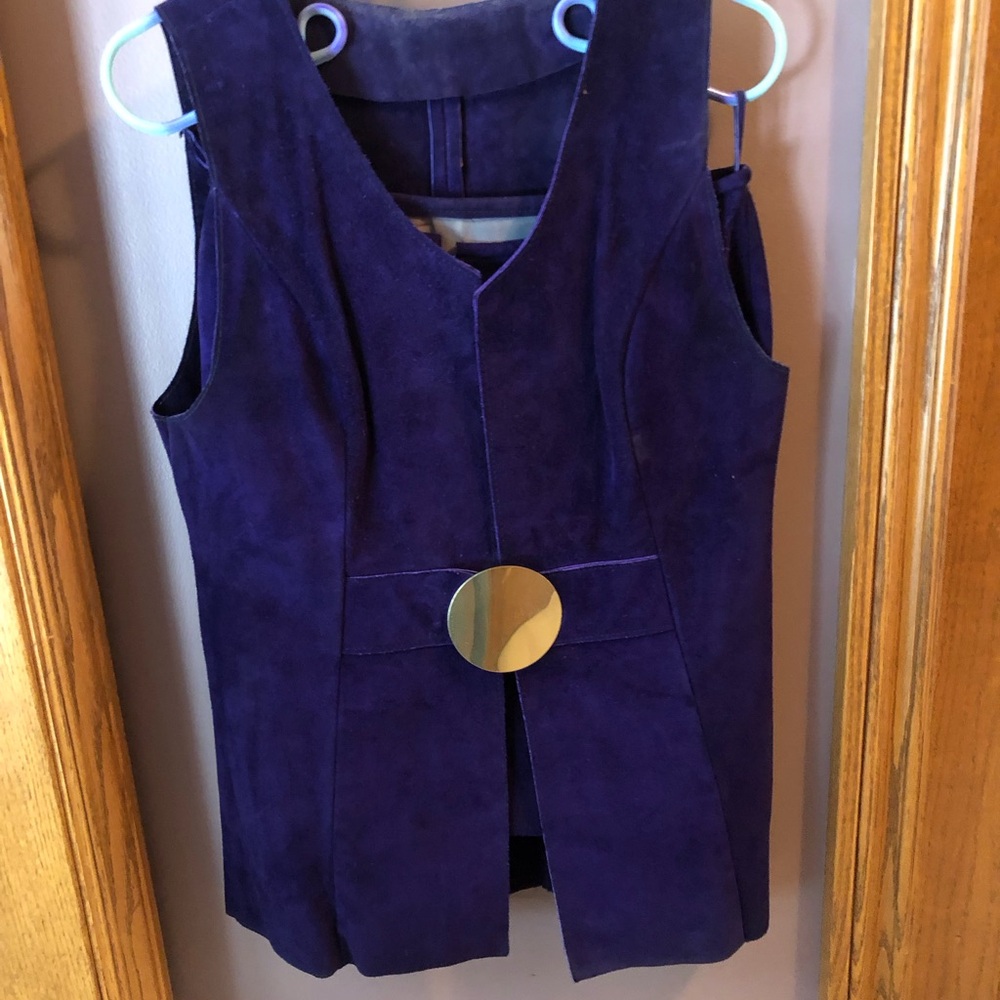 Stylish purple short skirt with cool long vest. All suede with a lined skirt.